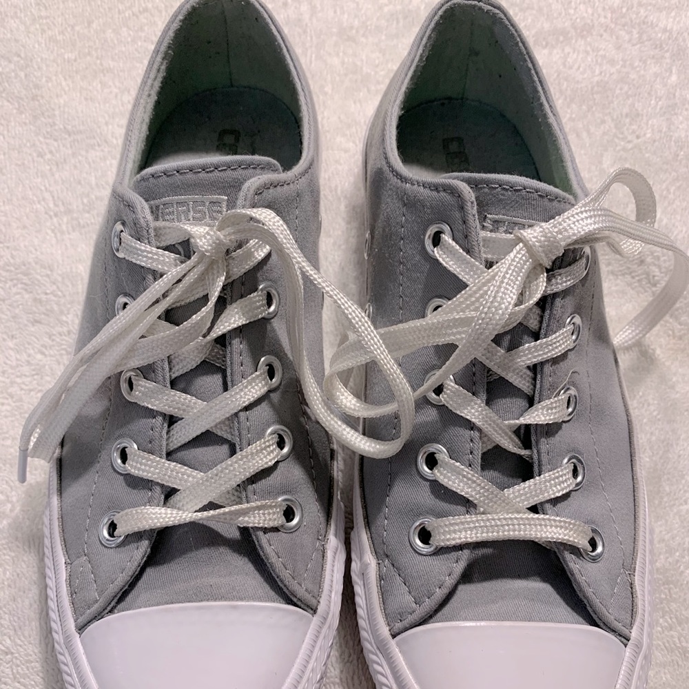 Grey and white Converse All Stars